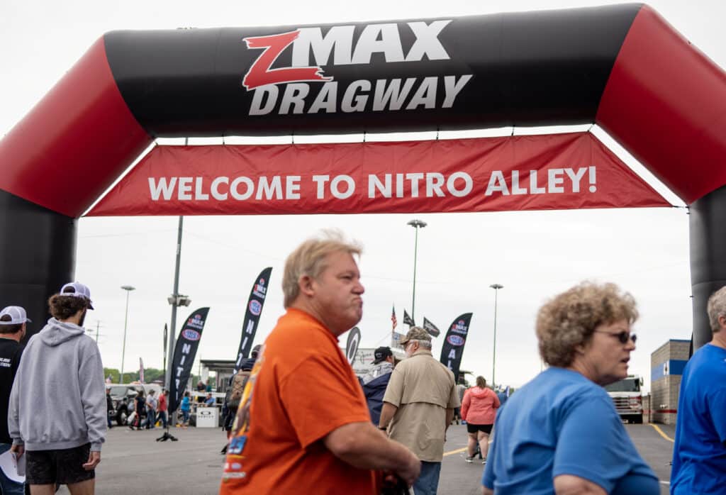 the inflatable entrway arch for zmax dragway with a sign that says "welcome to nitro alley!"