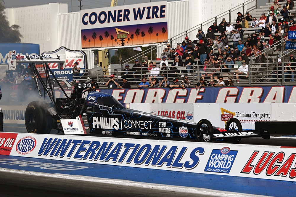 Justin Ashley's Top Fuel dragster racing at the 2022 Winternationals